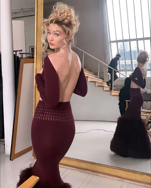 Designer Zac Posen shares a behind-the-scenes shot of American model Gigi Hadid in the second decade of March 2022. (Photo by gigihadid/Instagram)