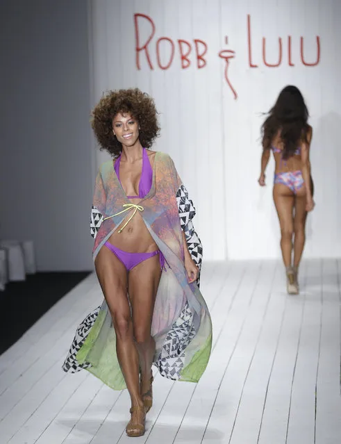 A model walks down the runway during the Robb & Lulu swimwear show as part of Funkshion Fashion Week Swim, Friday, July 17, 2015, in Coral Gables, Fla. (Photo by Lynne Sladky/AP Photo)