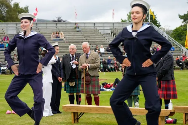 HRH Charles Prince of Wales, The Duke of Rothesay when in Scotland, watches female Highland dancers during a visit to the Grampian Highland Games Gathering at The Princess Royal and Duke of Fife Memorial Park, Braemar, Grampian United Kingdom on August 14, 2021. (Photo by Stuart Wallace/Rex Features/Shutterstock)