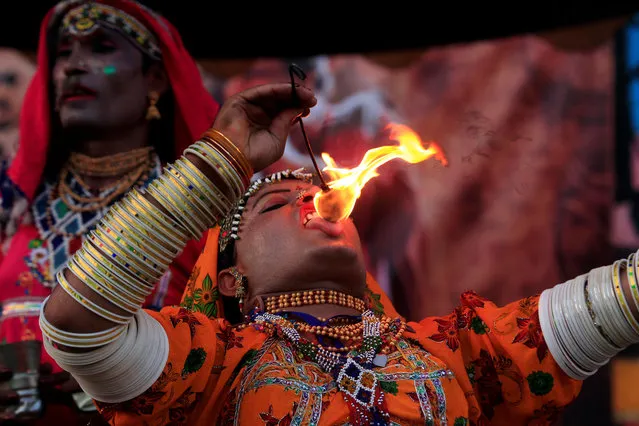 A folk artist from Cholistan performs at a folk heritage festival in Islamabad, Pakistan, April 12, 2017. (Photo by Faisal Mahmood/Reuters)