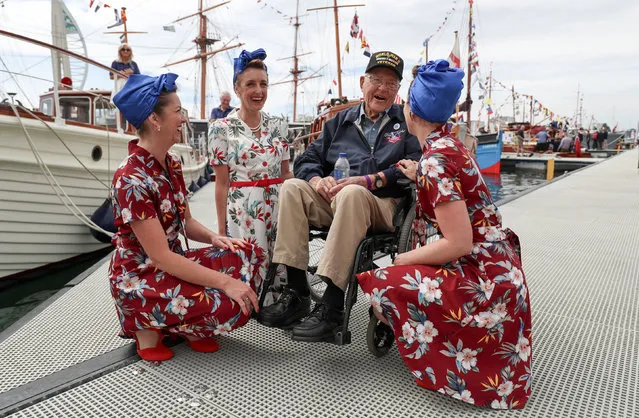 Bert Chandler, an American D-day veteran, meets members of the Charlalas close harmony group during an event at Portsmouth Historic Dockyard in Portsmouth, England on June 2, 2019. (Photo by Andrew Matthews/PA Images via Getty Images)
