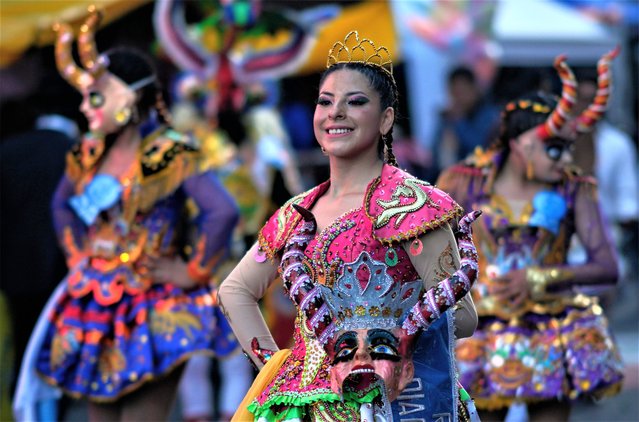 A dancer performs the “Diablada” during an annual parade in honor of “Jesus del Gran Poder”, or “The Lord of Great Power” in La Paz, Bolivia, Saturday, June 3, 2023. Thousands of dancers, musicians and faithful gather every year for the festival to show their devotion and gratitude. (Photo by Juan Karita/AP Photo)