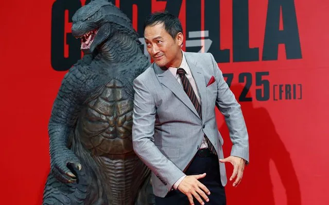 Japanese actor Ken Watanabe poses for photographers during the Japan premiere of his movie “Godzilla” in Tokyo, Thursday, July 10, 2014. (Photo by Shizuo Kambayashi/AP Photo)
