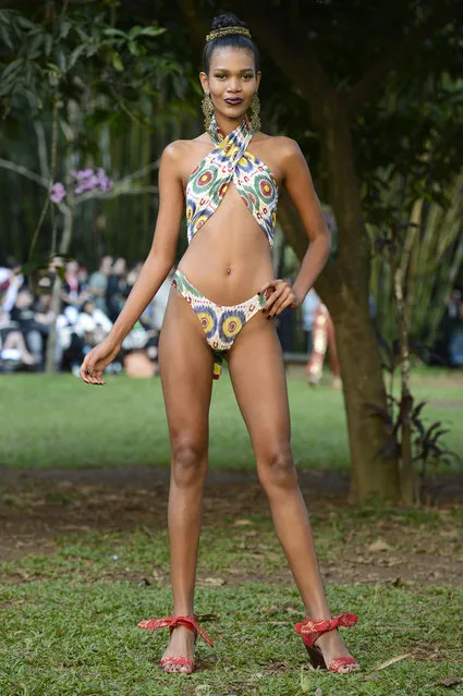 A model walks the runway during the Neon Sao Paulo Fashion Week Spring/Summer 2013 Collections Show on June 14, 2012 in Sao Paulo, Brazil