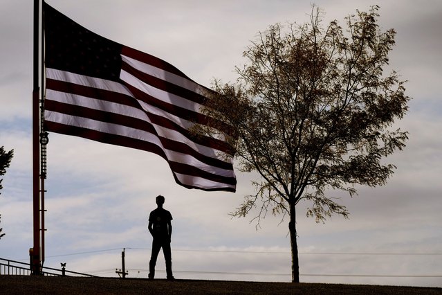 A volunteer waits for Democratic vice presidential nominee Minnesota Gov. Tim Walz to arrive at a campaign rally, Saturday, October 19, 2024, in Papillion, Neb. (Photo by Charlie Neibergall/AP Photo)