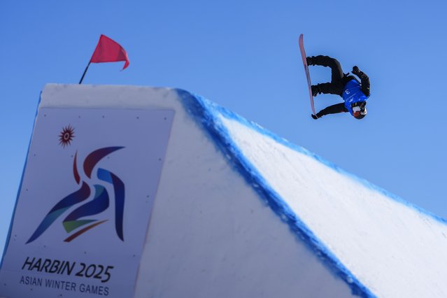 Liu Haoyu of China competes in the Men's Snowboard Big Air at the 9th Asian Winter Games in Yabuli in northeast China's Heilongjiang province on Monday, February 10, 2025. (Photo by Andy Wong/AP Photo)