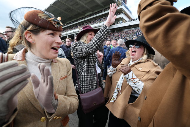 Racegoers get into the swing of the Cheltenham Festival on March 11, 2025, which this year has relaxed its rules to allow punters to take drinks trackside at the final fence and just after the winning post as it tries to reverse an 18 per cent fall in ticket sales. (Photo by Times photographer Richard Pohle)