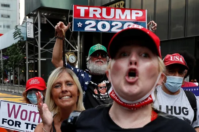Supporters of U.S. President Donald Trump gather near the newly painted Black Lives Matter mural to protest outside of Trump Tower on Fifth Avenue in Manhattan, New York City, U.S., July 11, 2020. (Photo by Andrew Kelly/Reuters)