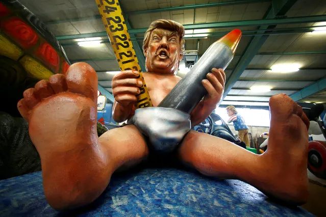 A papier mache caricature depicting U.S. President Donald Trump is pictured during preparations for the upcoming Rose Monday carnival parade in Mainz, Germany, February 6, 2018. (Photo by Ralph Orlowski/Reuters)