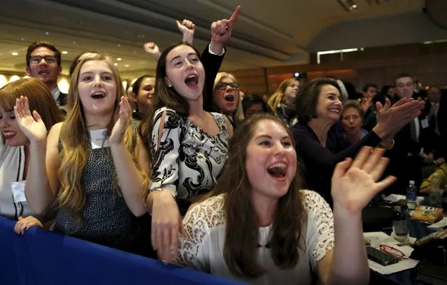 Women react as they listen to U.S. President Barack Obama address the DNC's Women's Leadership Forum in Washington October 23,  2015. (Photo by Kevin Lamarque/Reuters)