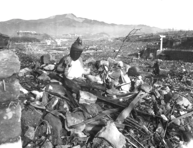 In this September 24, 1945, file photo, released by U.S. Marines, a battered religious figure stands witness on a hill above a burn-razed valley at Nagasaki, Japan, after the second atomic bomb ever used in warfare was dropped by the U.S. over the Japanese industrial center. The city of Nagasaki in southern Japan marks the 75th anniversary of the U.S. atomic bombing of Aug. 9, 1945. (Photo by U.S Marines via AP Photo/File)