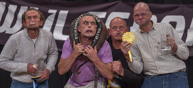 Huge crowds turned out yesterday, September 22, 2025, to watch the famous World Gurning Championships 2025. The international competition sees competitors put their face between a horseshoe collar and pull a ridiculous facial expression. Dozens of hopefuls took part in the event, which is part of the Egremont Crab Fair, in Cumbria, UK, which also sees wheelbarrow races and horn-blowing competition's. (Photo by Carlos Reina Photography/South West News Service)
