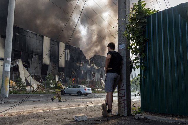Firefighters work to extinguish a fire at the site of a Russian missile strike in Odesa, on June 24, 2024, amid the Russian invasion of Ukraine. (Photo by Oleksandr Gimanov/AFP Photo)
