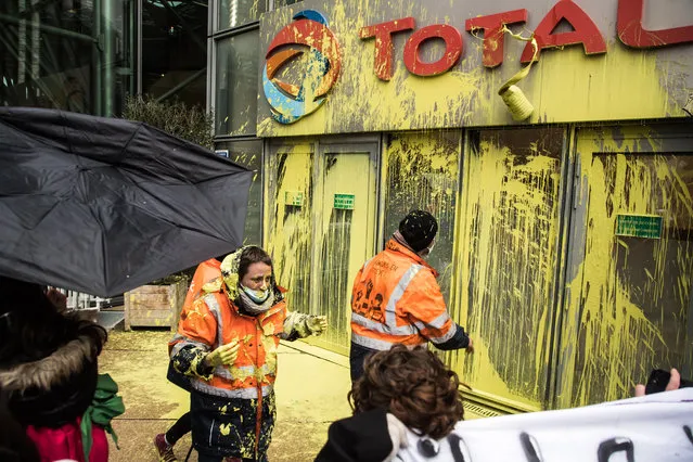 Oil French company Total's employees demonstrate at its headquarters in La Defense, Paris business district, France, 26 January 2021. Total plans to close its Grandpuits refinery and reassigning its workers to bio-fuel production. (Photo by Christophe Petit-Tesson/EPA/EFE)
