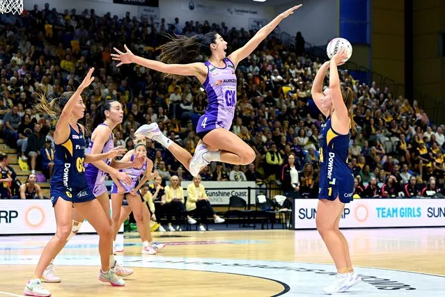 Steph Wood of the Lightning shoots as Remi Kamo of the Firebirds attempts to block her shot during the round 14 Super Netball match between Sunshine Coast Lightning and Queensland Firebirds at University of Sunshine Coast Stadium, on June 18, 2023, in Sunshine Coast, Australia. (Photo by Bradley Kanaris/Getty Images)