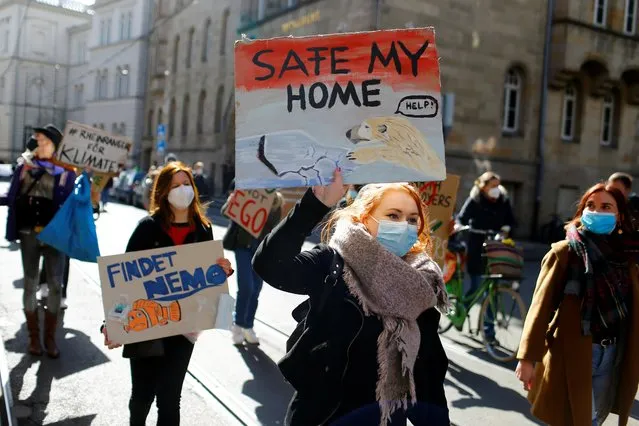 Fridays for Future activists protest calling for a “Global Day of Climate Action”, as the spread of the coronavirus disease (COVID-19) continues, in Bonn, Germany, March 19, 2021. (Photo by Thilo Schmuelgen/Reuters)