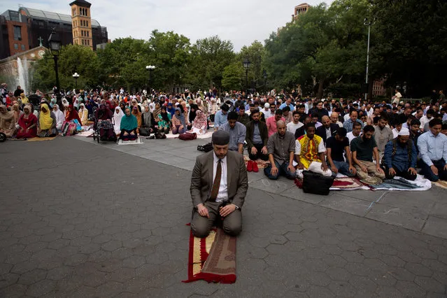 Imam Suhaib Webb leads Eid al-Adha prayers in Washington Square Park in Manhattan, New York, August 21, 2018. (Photo by Amr Alfiky/Reuters)