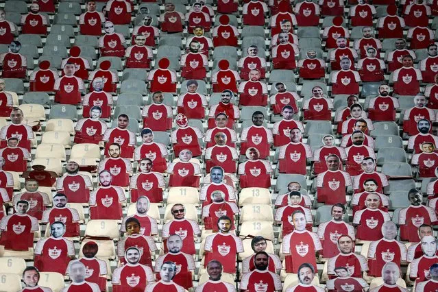 Life-size cutouts depicting a crowd of spectators are placed in empty seats during the AFC Champions League group E football match between Persepolis FC and al-Nassr FC at Tehran's Azadi stadium, on September 19, 2023.  (Photo by Atta Kenare/AFP Photo)