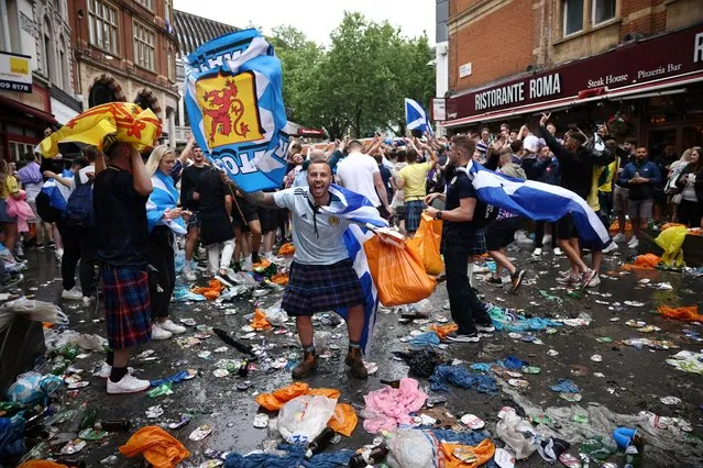 Scotland fans gather in Leicester Square prior to the Euro 2020 soccer championship match between England and Scotland, in London, Britain on June 18, 2021. (Photo by Henry Nicholls/Reuters)