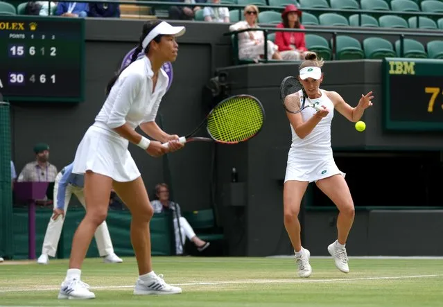 Hsieh Su-Wei (left) and Elise Mertens in action against Ena Shibahara and Shuko Aoyama in the semi final womens double match on court 1 on day eleven of Wimbledon at The All England Lawn Tennis and Croquet Club, Wimbledon on Friday, July 9, 2021. (Photo by John Walton/PA Images via Getty Images)