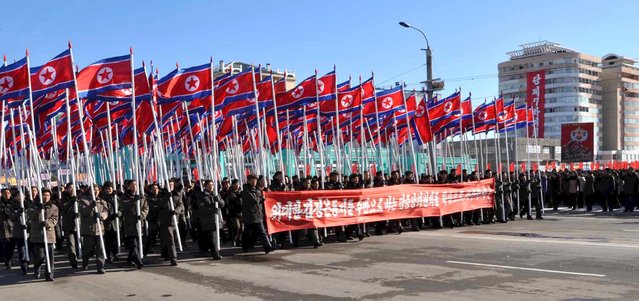 People take part in mass rallies held across the country vowing to carry out tasks set forth by North Korean leader Kim Jong Un in this undated photo released by North Korea's Korean Central News Agency (KCNA) in Pyongyang on January 8, 2016. (Photo by Reuters/KCNA)