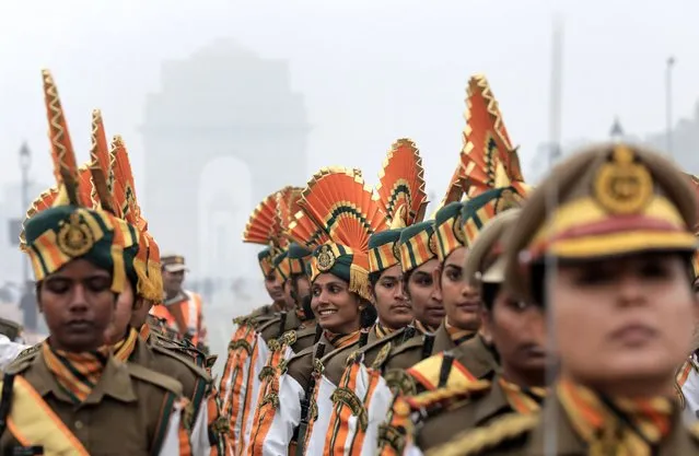 Indian paramilitary soldiers take part in the Republic Day parade rehearsal in New Delhi, India, 04 January 2024. India will celebrate Republic Day on 26 January 2024. French President Emmanuel Macron will be Chief Guest for the 75th Republic Day celebrations, at the invitation of Indian Prime Minister Narendra Modi. (Photo by Rajat Gupta/EPA)