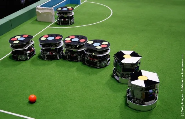 Small size robots in action during the Robocup