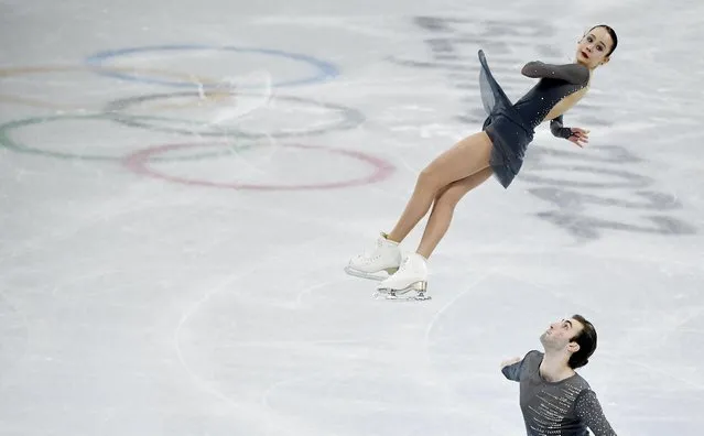 Karina Safina and Luka Berulava of Georgia skate in the Pair Skating Short Program Team Event during the Beijing 2022 Winter Olympic Games at Capital Indoor Stadium on February 04, 2022 in Beijing, China. (Photo by Toby Melville/Reuters)