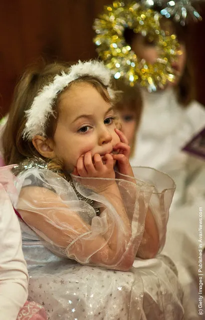 Children perform during a traditional Christmas Nativity