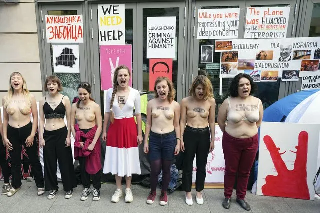 Women take part in a demonstration against Belarusian President Alexander Lukashenko in Warsaw, Poland, Wednesday, June 2, 2021. Three members of the ethnic Polish minority in Belarus who had been under arrest for their political opposition to the country's regime are now free and in Poland. The Polish Foreign Ministry announced on Wednesday that the three arrived in Poland on May 25. (Photo by Czarek Sokolowski/AP Photo)