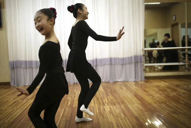 North Korean schoolgirls attend a dance class at the Mangyongdae Children's Palace on Friday, April 14, 2017, in Pyongyang, North Korea. (Photo by Wong Maye-E/AP Photo)
