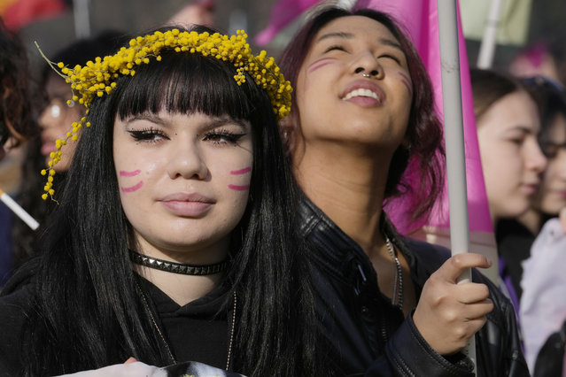 People march during a rally on International Women's Day in Milan, Italy, Wednesday, March 8, 2023. (Photo by Luca Bruno/AP Photo)