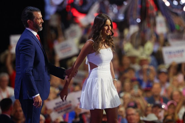 Donald Trump Jr. and his daughter Kai stand onstage on Day 3 of the RNC in Milwaukee on July 17, 2024. (Photo by Brian Snyder/Reuters)