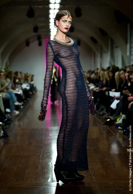 A model walks the runway during the Fyodor Golan show at London Fashion Week Autumn/Winter 2012 at Somerset House