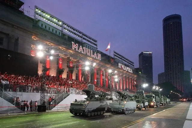 The mobile column display roll past in front of City Hall during the National Day Parade at Padang on August 9, 2015 in Singapore. Singapore is celebrating her 50th year of independence on August 9, 2015. (Photo by Suhaimi Abdullah/Getty Images)