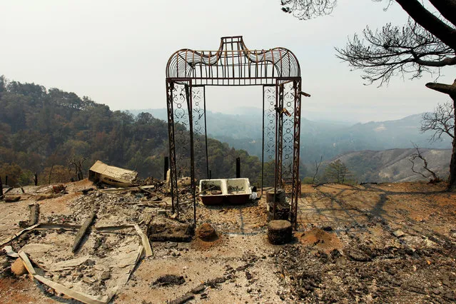 A garden structure is seen at the site of a destroyed home after the Soberanes Fire burned through the Palo Colorado area, north of Big Sur, California, July 31, 2016. (Photo by Michael Fiala/Reuters)