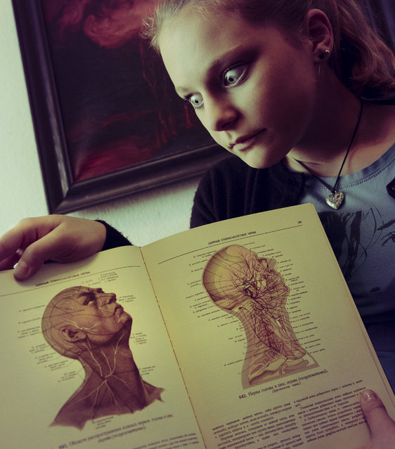 The girl with the anatomy atlas