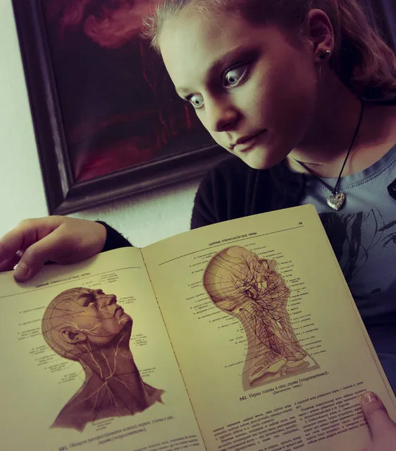 The girl with the anatomy atlas