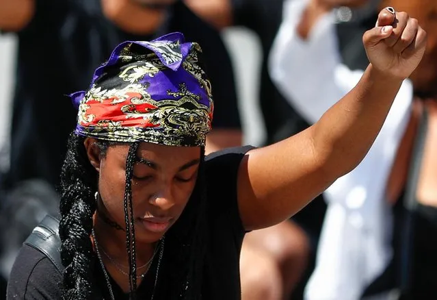A protester gestures as she takes part in a protest against the death in Minneapolis police custody of African-American man George Floyd, in central Brussels, Belgium on June 1, 2020. (Photo by Francois Lenoir/Reuters)