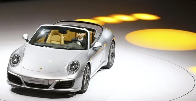 New Porsche 911 Carrera S cabrio car is presented during the Volkswagen group night ahead of the Frankfurt Motor Show (IAA) in Frankfurt, Germany, September 14, 2015. (Photo by Kai Pfaffenbach/Reuters)