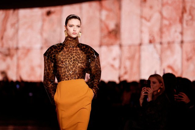 A model presents a creation by designer Anthony Vaccarello as part of his Fall/Winter 2025-2026 Women's ready-to-wear collection show for fashion house Saint Laurent during Paris Fashion Week in Paris, France, on March 11, 2025. (Photo by Benoit Tessier/Reuters)