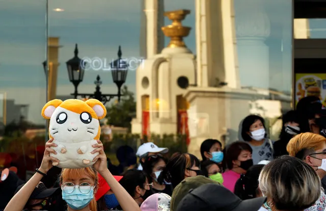 A demonstrator holds a soft toy during a protest demanding the resignation of Thailand's Prime Minister Prayuth Chan-o-cha, in Bangkok, Thailand, July 26, 2020. (Photo by Jorge Silva/Reuters)