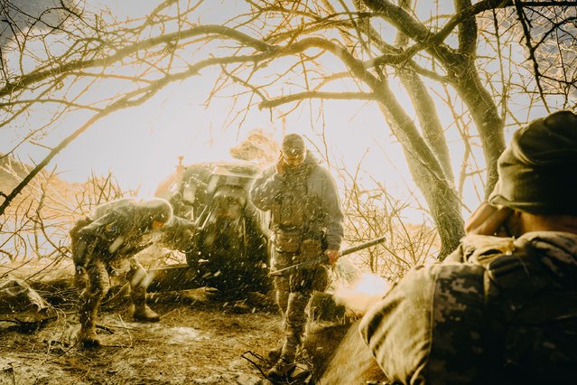 Soldiers from the Aidar Battalion fire a D30 Howitzer from a position in Donbas, Ukraine, on February 3, 2024. (Photo by Wojciech Grzedzinski/For The Washington Post)
