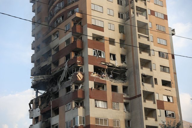 A building stands damaged in the aftermath of Israeli strikes, in Tehran, Iran, on June 13, 2025. (Photo by Majid Asgaripour/WANA News Agency via Reuters)