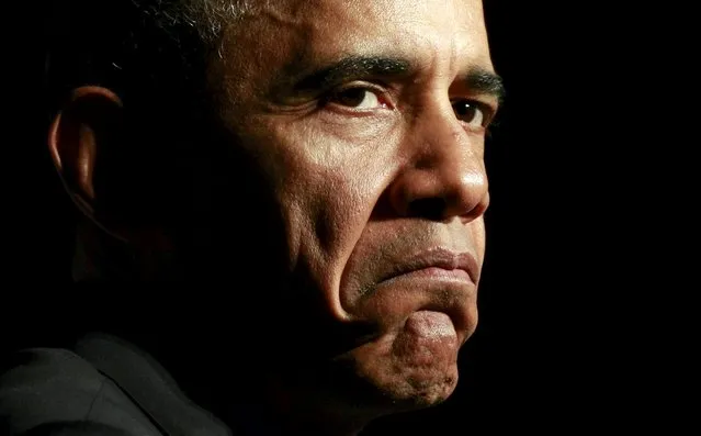 U.S. President Barack Obama makes a  "grumpy cat" face, referring the internet celebrity,  while speaking at the DNC's Women's Leadership Forum in Washington October 23,  2015. (Photo by Kevin Lamarque/Reuters)