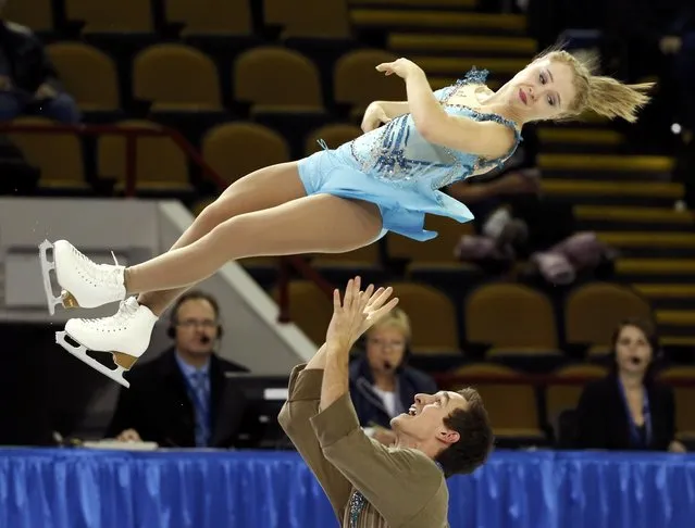 Julianne Seguin and Charlie Bilodeau of Canada perform during the Pairs short program at the Skate America figure skating competition in Milwaukee, Wisconsin October 23, 2015. (Photo by Lucy Nicholson/Reuters)