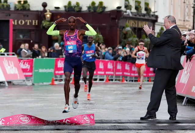 Britain' s Mo Farah crosses the finish line to win the half marathon elite men' s race during the inaugural The Big Half in London on March 4, 2018. (Photo by Andrew Boyers/Reuters/Action Images)