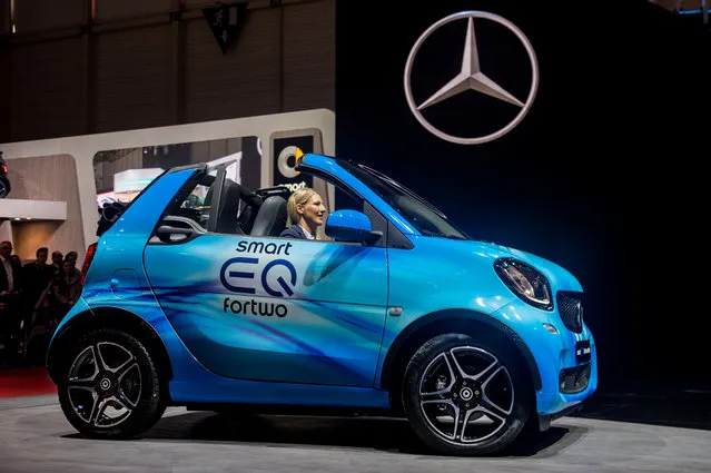 Smart EQ For Two is being presented at the Press Conference at the 88th Geneva International Motor Show on March 6, 2018 in Geneva, Switzerland. Global automakers are converging on the show as many seek to roll out viable, mass-production alternatives to the traditional combustion engine, especially in the form of electric cars. The Geneva auto show is also the premiere venue for luxury sports cars and imaginative prototypes. (Photo by Robert Hradil/Getty Images)