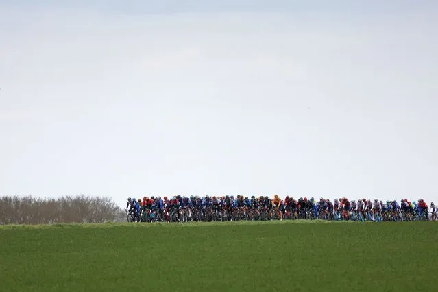 The pack rides during the 1st stage of the 81st Paris - Nice cycling race, 169,4 km between La Verriere and La Verriere, on March 5, 2023. (Photo by Anne-Christine Poujoulat/AFP Photo)