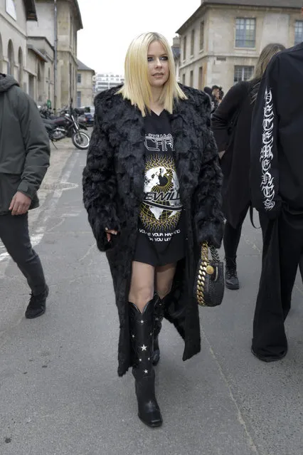 Canadian singer-songwriter Avril Lavigne arrives at the Stella McCartney Fall/Winter 2023-2024 ready-to-wear collection presented Monday, March 6, 2023 in Paris. (Photo by Vianney Le Caer/Invision/AP Photo)
